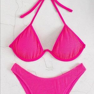 Pink two piece swimsuit.